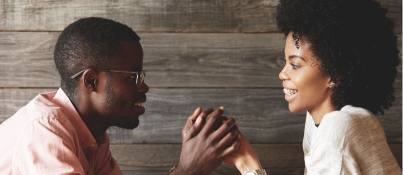 Couple holding each other hands