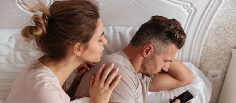 Woman spying on her husband