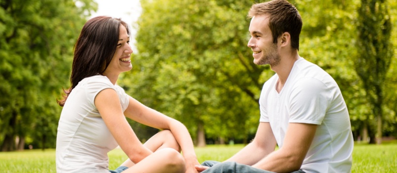 Couple sitting in park
