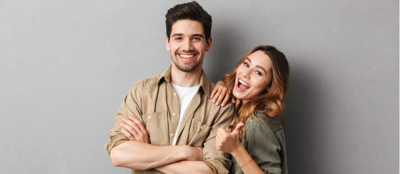 Cheerful couple standing