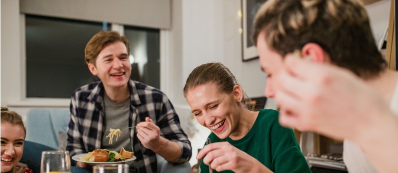 Happy family having meal