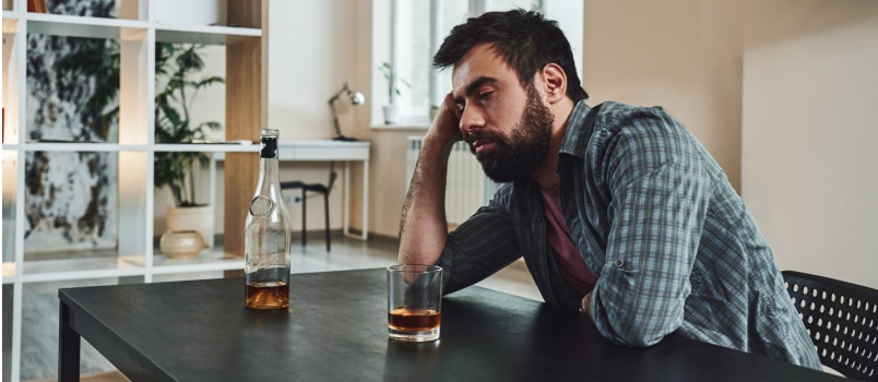 Man having excessive alcohol problem