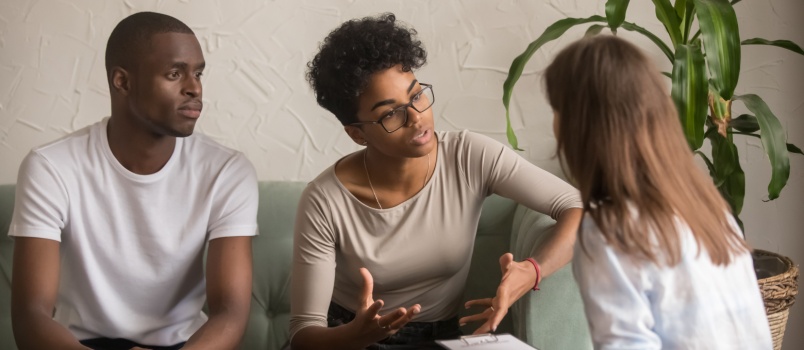 Young couple taking therapy session