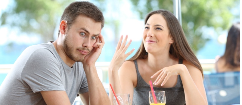 Man listening to talkative woman