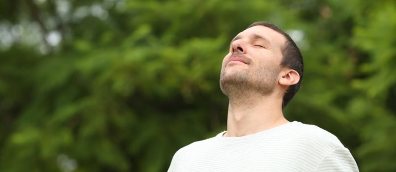 Man breathing fresh air