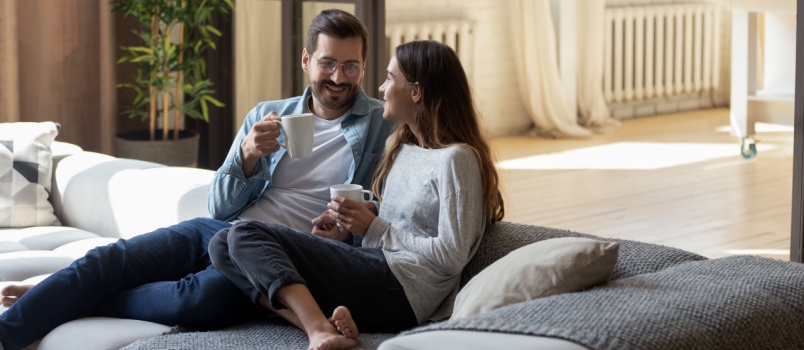 Couple relaxing on couch