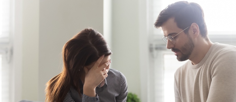 Husband comforting wife