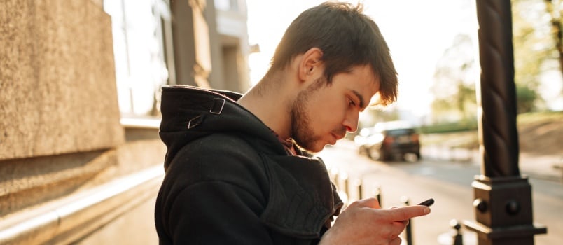 Young man using smartphone