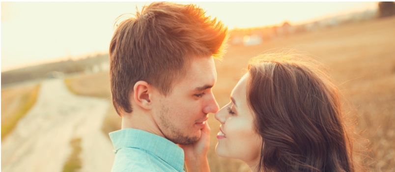 Young couple love outdoor hugging beautiful
