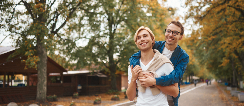 Gay couple enjoying evening walk