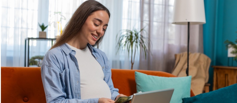 Pregnant woman counting money