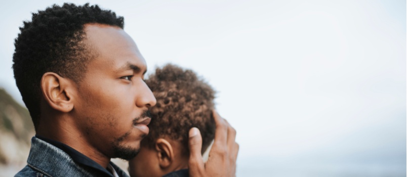 Dad and son hugging each other