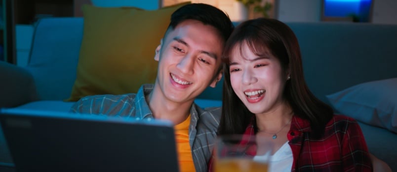 Young couple watching movie