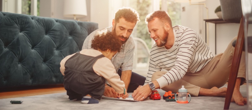 LGBT family playing with kid