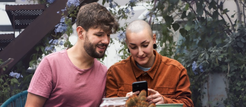 Two guy looking in phone