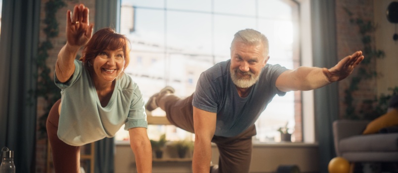 Old couple doing yoga