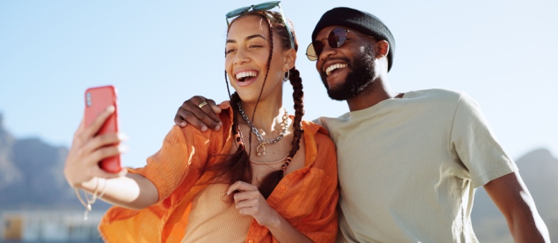 Young couple taking selfie