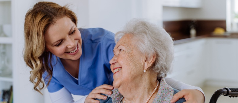 Nurse helping senior client