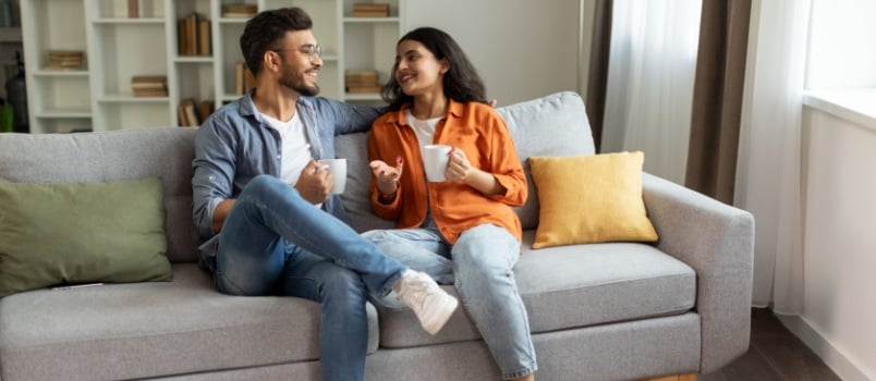 Relaxing couple having coffee