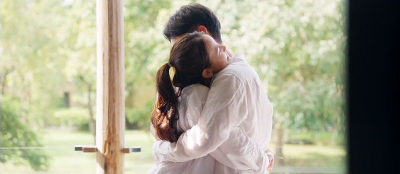 Young couple hugging each other