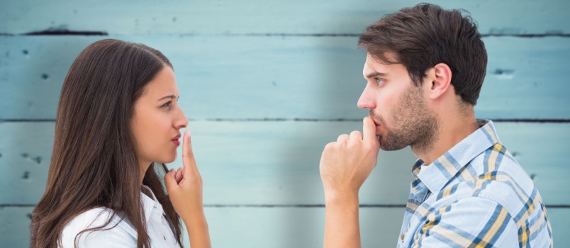 Upset couple looking at each other