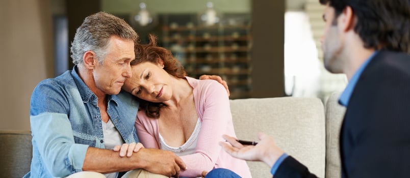 Mature couple consulting an expert