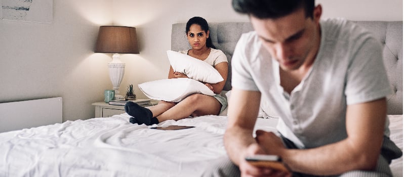 Husband spending more time on phone than with wife