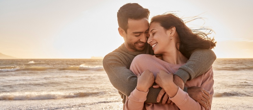 Couple hugging on a beach