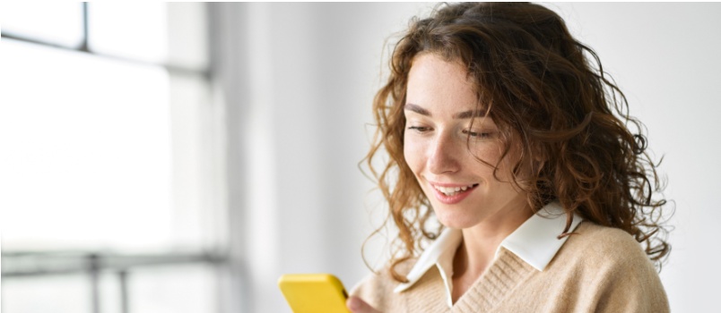 Women enjoy using her phone