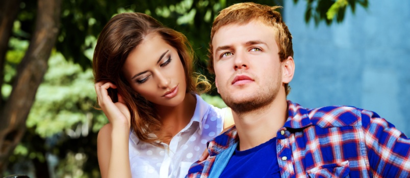 Beautiful couple sitting on bench