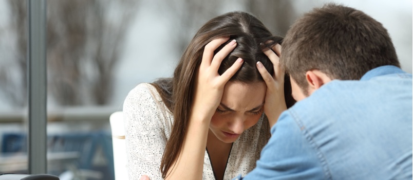 Sad depressed young couple
