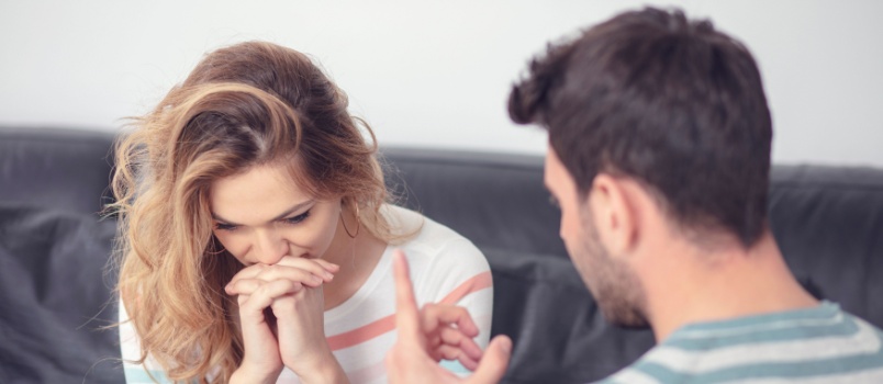 Boy telling something to his girlfriend