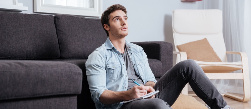Sad man sitting alone