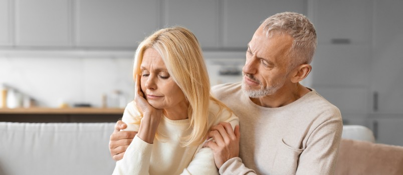 Husband consoling sad wife