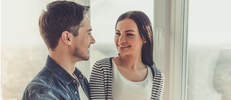 Young couple talking while smiling