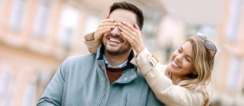 Woman surprising his boyfriend