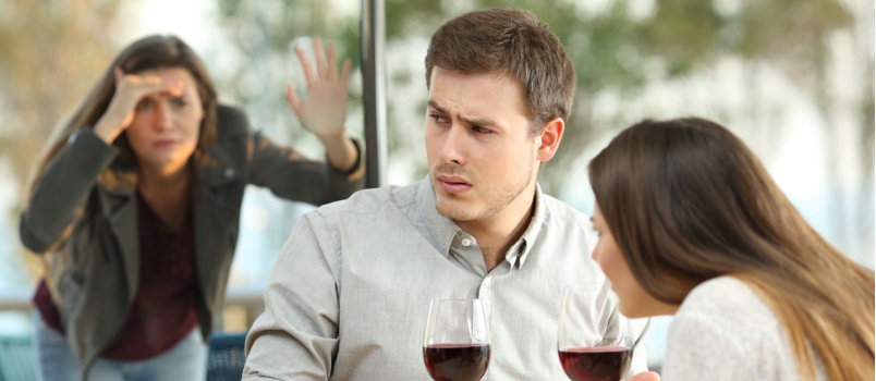 Woman spying on couple