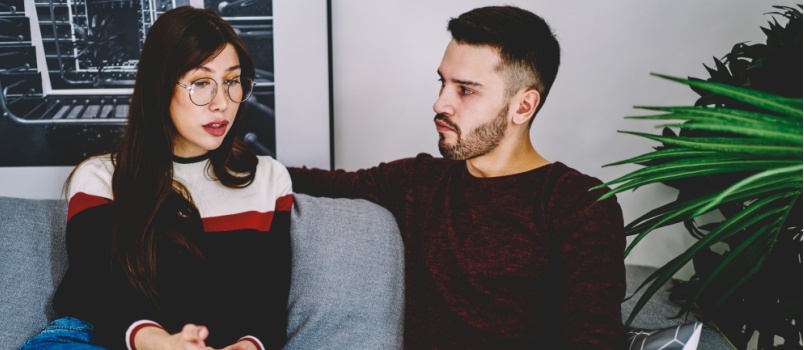 Young couple having serious conversation