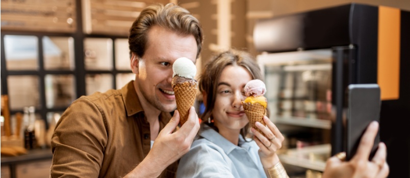 Young couple taking selfie