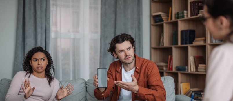 Man showing something on the phone