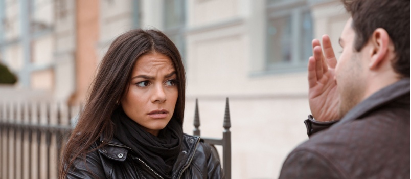 Couple fighting outdoors