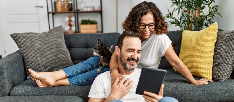 Couple watching something on the tablet