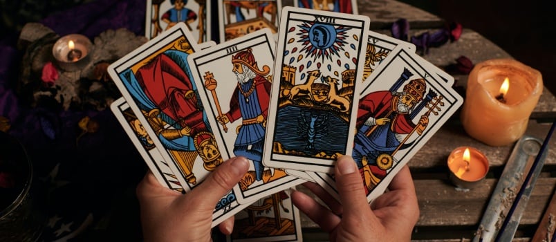 Fortune teller reading tarot cards