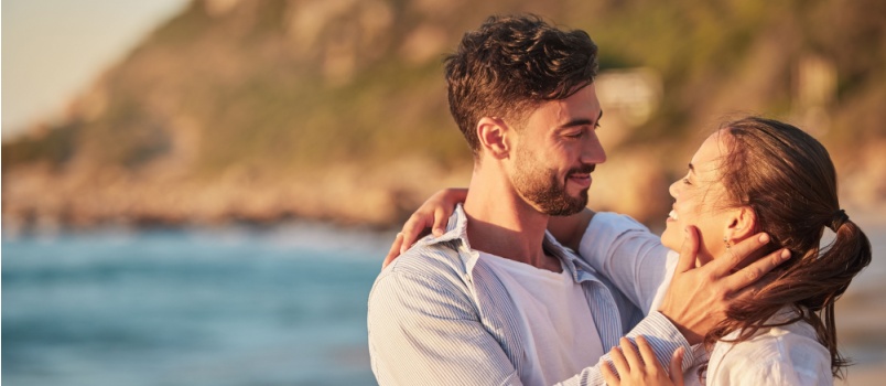 Love couple embrace near beach