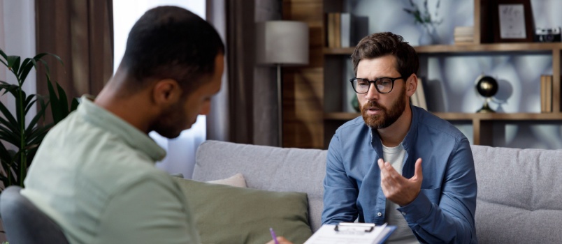 Man counsulting with expert