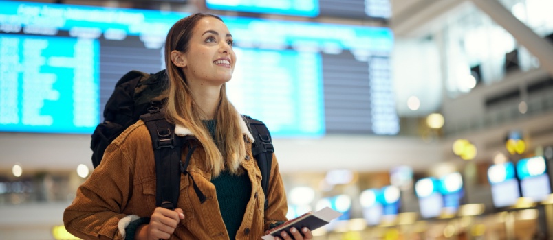 Woman so happy to board her flight