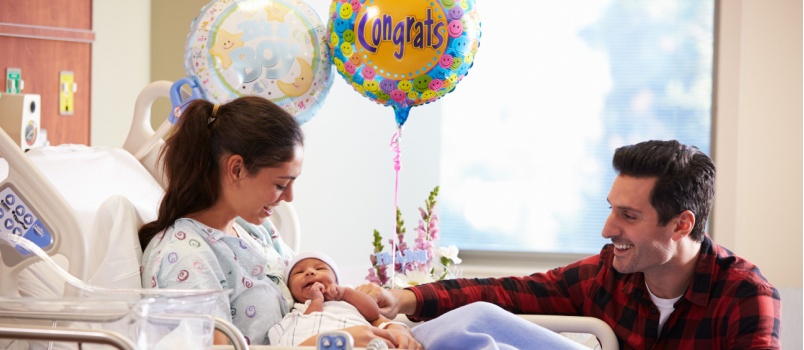 Couple welcoming their newly born baby in the world