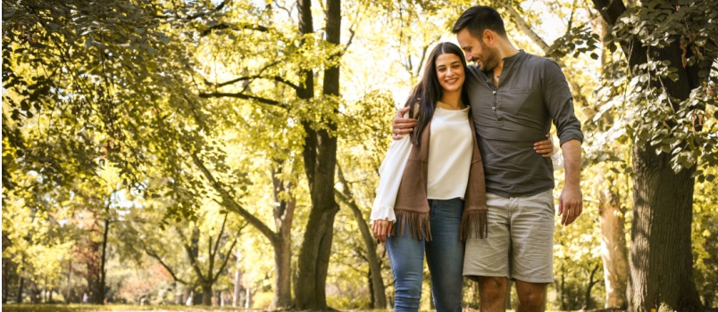 Young couple having fun in park