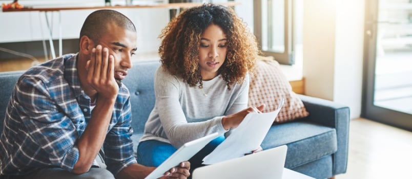 Young couple calculating banking finance