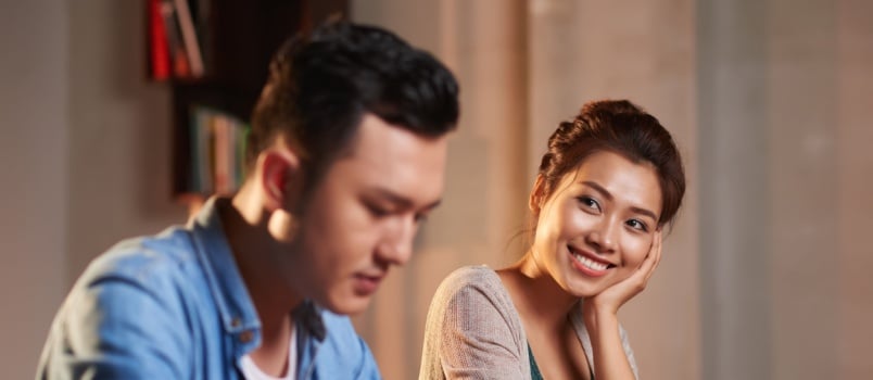 Woman looking at man lovingly